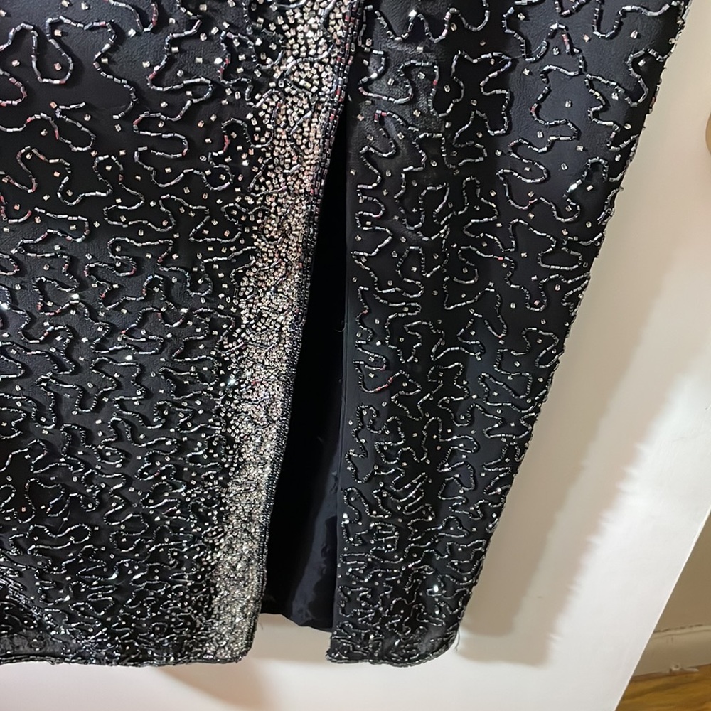 Heavy beaded dress. Sexy elegant definitely a show stopper.